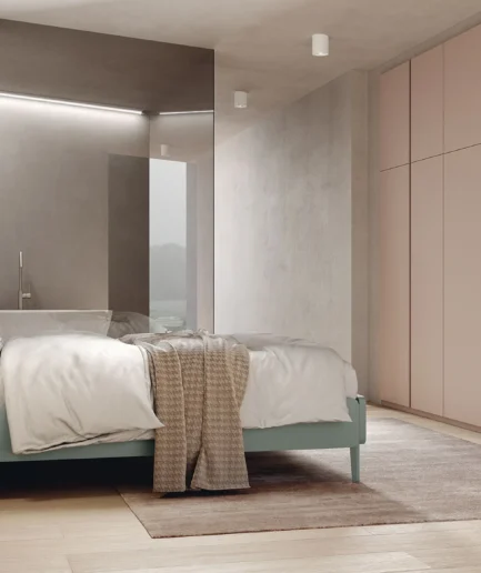 Dormitorio de matrimonio moderno con cabezal Bandeja metal y armario con altillo