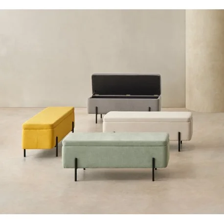 banqueta-tapizada-viena-con-almacenaje Banqueta Viena gris de 120 cm con compartimento de almacenaje oculto y patas metálicas negras.